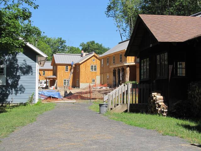 Nice perspective of the lodgings relative to the Broom shop and new-ish bath-house.