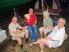 candid, and fun, night shot of patrick, john, susie, terri