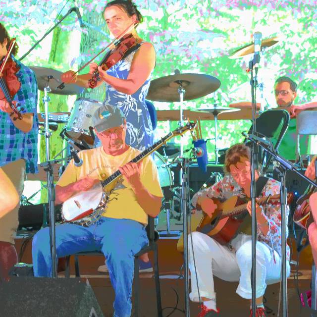 Peter playing the five string banjo!?  Sacrilege!